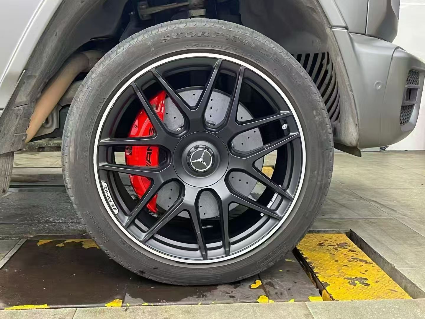 G63 workshop installation with a red caliper
