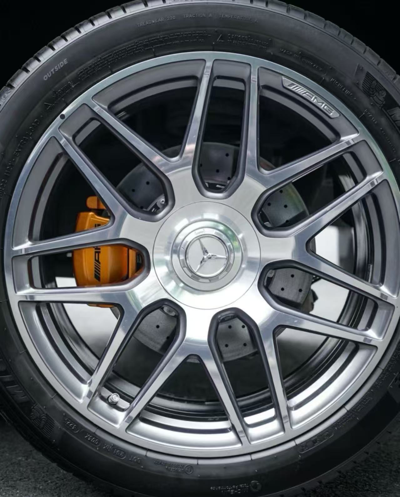Rear wheel brake detail with a gold caliper