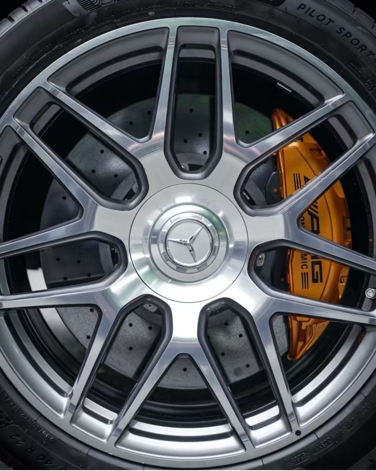 Front wheel close-up showing the rotor surface